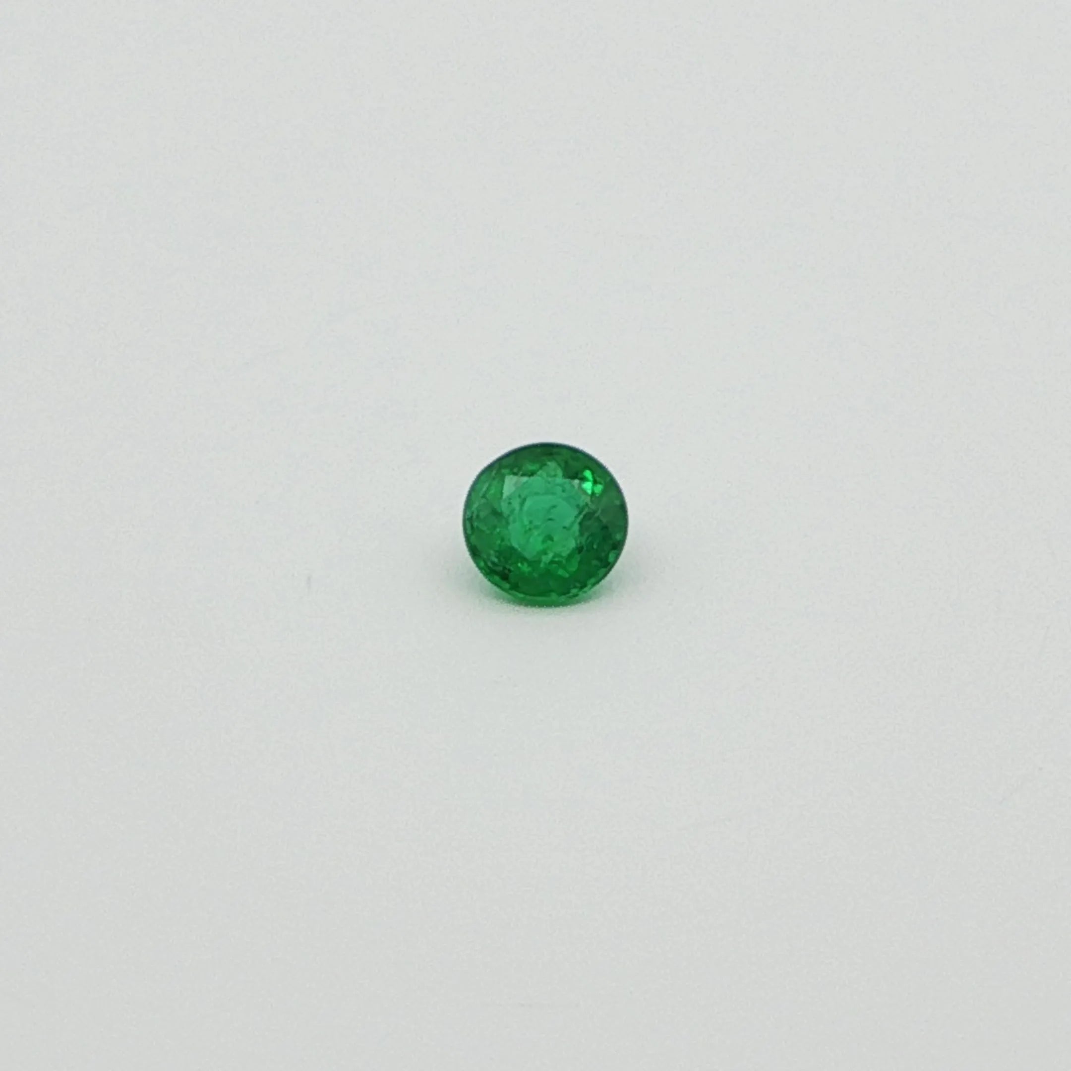 0.23ct Round Natural Emerald (Colour Green, Clarity Slightly Included, Cut Faceted)