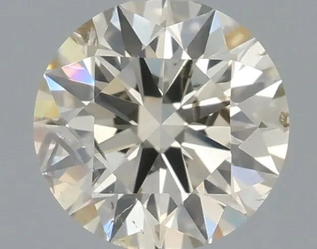 0.56ct Round Natural Diamond (Colour M, Clarity SI2, Cut EX, IGI Certified)