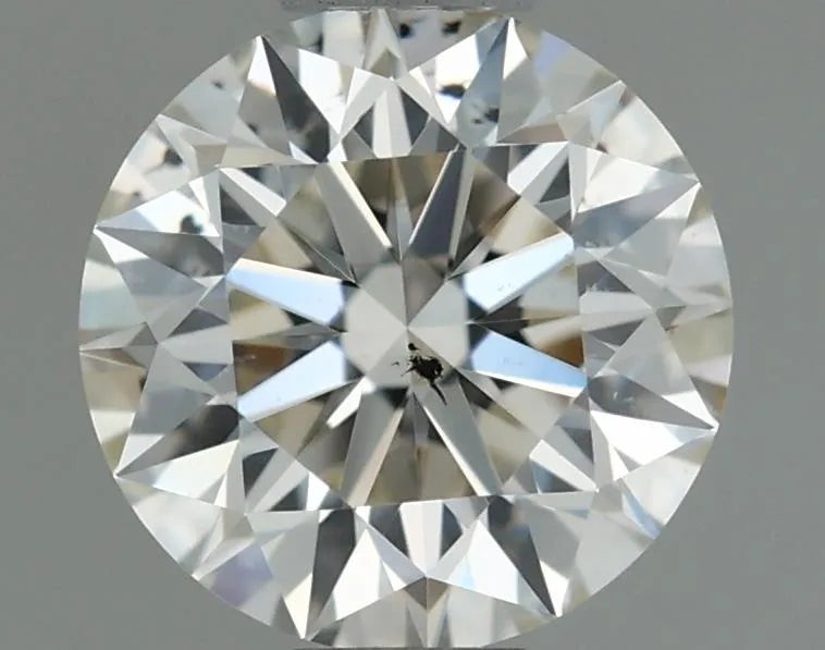 0.58ct Round Natural Diamond (Colour J, Clarity SI1, Cut EX, IGI Certified)