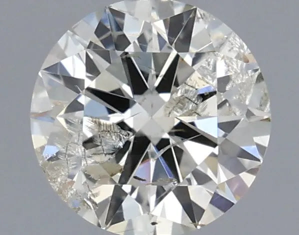 0.70ct Round Natural Diamond (Colour J, Clarity I1, Cut EX, IGI Certified)