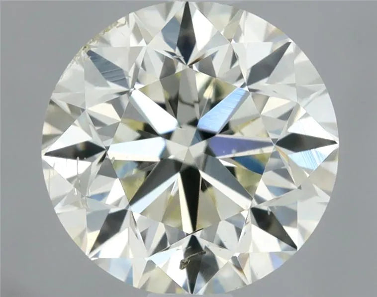 0.90ct Round Natural Diamond (Colour J, Clarity SI1, Cut VG, IGI Certified)