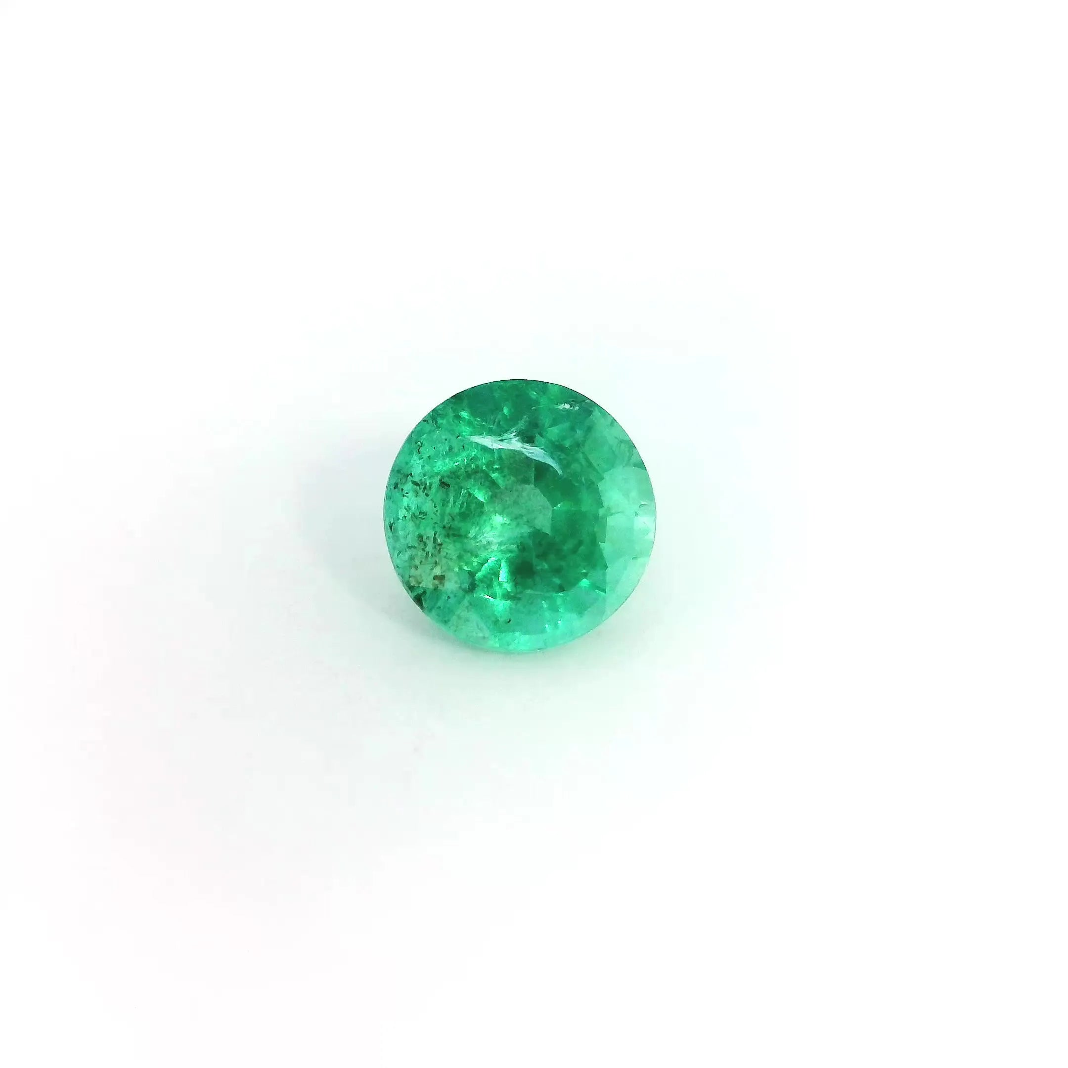1.11ct Round Natural Emerald (Colour Green, Clarity Moderately Included, Cut Faceted)