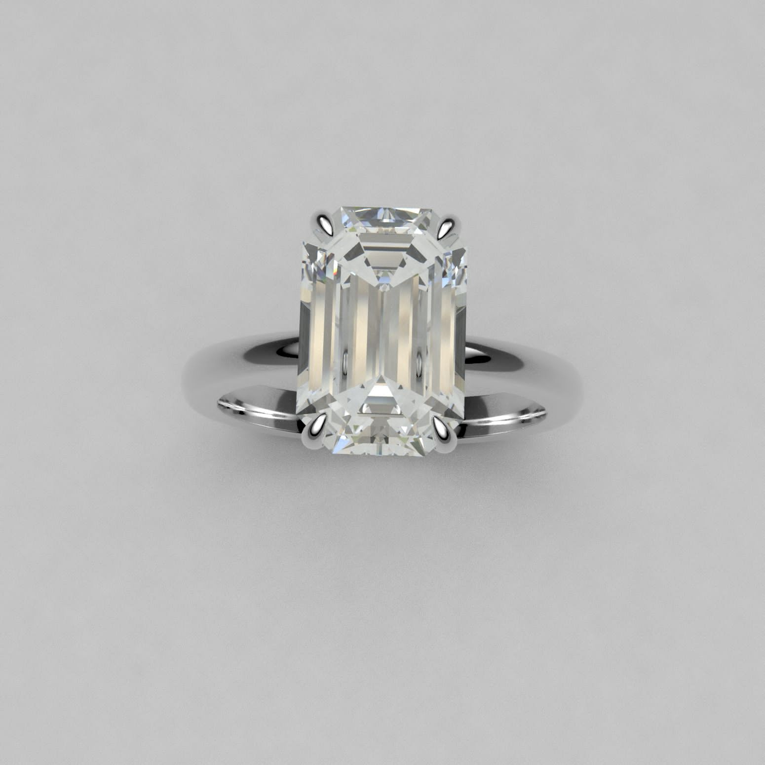 Emerald cut ring solitaire